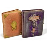 Two early 20th century canvas photograph albums, the first with applied copper Arts and Crafts style