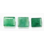EMERALD; three octagon shaped stones totalling 25.86ct.