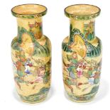 A pair of modern Chinese crackle glazed Famille Verte vases decorated with warriors on horseback,