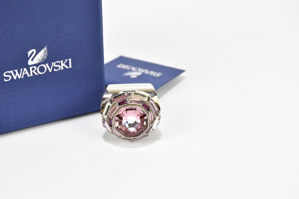 SWAROVSKI; a LMUL/PDS silver tone dress ring with a large rose pink crystal solitaire surrounded - Image 2 of 3