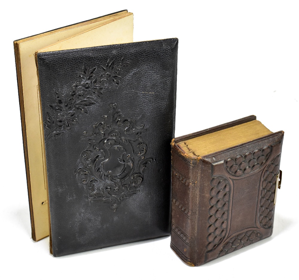 Two late 19th/early 20th century photograph albums including a concertina example bearing a