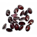 MOZAMBIQUE GARNET; twenty 10 x 6.5mm oval cut stones.