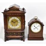 LENZKIRCH; an early 20th century oak cased German mantel clock, with carved detail to the case