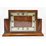 ENFIELD; an Art Deco walnut cased mantel clock, the silvered chapter ring with Arabic numerals, on