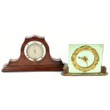 An Art Deco gilt metal and green glass electric mantel clock with movement named 'British Electric