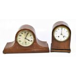 An Edwardian mahogany arch topped mantel clock, the enamelled dial set with both Arabic and Roman