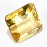 CITRINE; a facet octagonal cut stone weighing 32.09ct, 20 x 18mm.