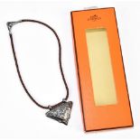 HERMÈS; a rare silver, marked 925, Touareg necklace with a silver pendant marked to the back by