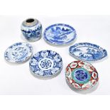 A 19th century Chinese blue and white wall charger, decorated with figures in landscape scene,