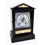 WINTERHALDER & HOFMEIER; a Victorian ebonised mantel clock, with enamelled blue and white face