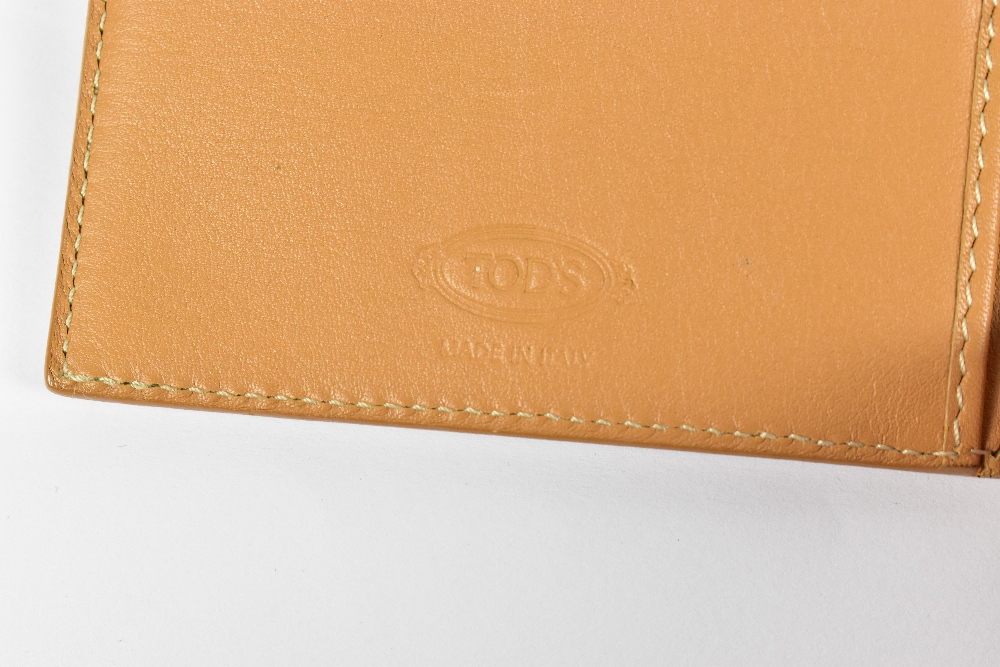 TOD'S; an unused beige leather soft calfskin wallet with embossed logo to front, embroidered - Image 4 of 4