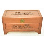 A mid-20th century Chinese carved camphor wood blanket chest, width 92cm, depth 45cm, height 47cm.