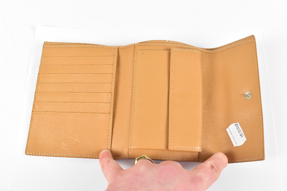 TOD'S; an unused beige leather soft calfskin wallet with embossed logo to front, embroidered - Image 3 of 4