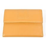 TOD'S; an unused beige leather soft calfskin wallet with embossed logo to front, embroidered