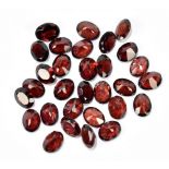 MOZAMBIQUE GARNET; thirty 8 x 6mm oval cut stones.