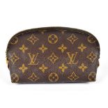 LOUIS VUITTON; a Monogram pochette coated leather cosmetic bag with tan cowhide leather trim and