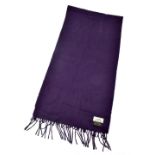 HERMÈS; a 100% cashmere long purple scarf with tasselled ends, and with a Hermès name tag to one