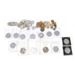 A collection of mainly commemorative coins and sundry coinage including American half dollars, etc.