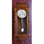 A 20th century oak Vienna wall clock by Ansonia Clock Co, New York, height 94cm, width 34cm.