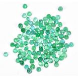 EMERALD; a group of 3.5mm round facet cut stones totalling 20ct.