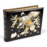 An early 20th century Japanese photograph album, with front lacquered panel with Shibayama