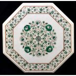 An Indian malachite inlaid octagonal table top, decorated with a spiraling floral design, diameter