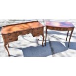 A Queen Anne style walnut dressing table with five drawers, cabriole legs, height 79cm, width 117cm,