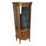 A reproduction French vitrine with gilt metal gallery top above gilt metal applied detail, the