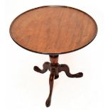 A George III and later mahogany circular occasional table, on tripod base, height 61cm, diameter