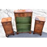 A reproduction walnut bookcase, with two drawers and bracket feet, height 101cm, width 64cm, and a