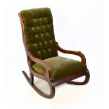 A Victorian mahogany rocking chair, with button back green upholstery, height 91cm.Additional