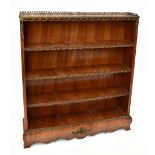 A 19th century French kingwood and walnut gilt metal mounted dwarf open bookcase, with four