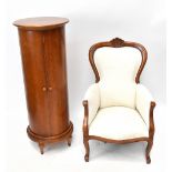 A modern Victorian style carved and stained beech salon chair, height 105cm, and a modern