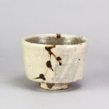 WILLIAM MARSHALL (1923-2007) for Leach Pottery; a stoneware straight sided bowl covered in white