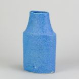 EMMANUEL COOPER (1938-2012); a stoneware oval bottle covered in blue volcanic glaze, impressed E