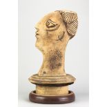 PAT HIGGINBOTHAM (1928-2010); 'Pot head', a large stoneware bust on a circular plinth with
