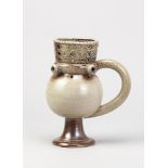 PETER MEANLEY (born 1944); 'Try Me', a salt glazed calligraphic puzzle jug, impressed PM mark