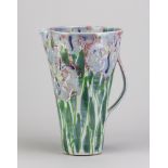 Dartington Pottery; a tall stoneware jug covered in the iris pattern designed by Janice Tchalenko,