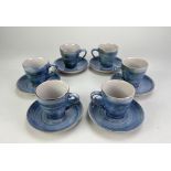 A set of six tin glazed earthenware cups and saucers, made in The Netherlands circa 1960, cup height