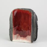 EDDIE CURTIS (born 1953); 'Nagano Mountain', a stoneware slab vessel partially covered in copper red