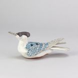 NEIL IONS (born 1949); a slip decorated earthenware ocarina in the shape of a bird, painted