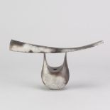 ANTONIA SALMON (born 1959); a smoke fired and burnished stoneware sculptural form with curved blade,