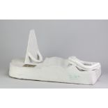 GORDON BALDWIN (born 1932); an earthenware sculptural form covered in white glaze with pinkish hues,