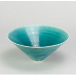 EMMANUEL COOPER (1938-2012); a porcelain conical bowl covered in turquoise glaze with gold and