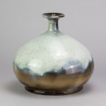 WAISTEL COOPER (1921-2003); a stoneware lamp base of squat form covered in green glaze with nuka