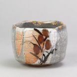 PASCAL GEOFFROY (born 1951); a large stoneware chawan covered in shino crackle glaze with iron and