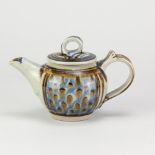 NIC HARRISON (born 1949); a stoneware teapot decorated with iron and cobalt on pale grey ground,