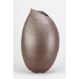 WENDY HOARE (born 1944); a large earthenware vessel with asymmetric rim and lightly textured surface