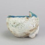 TAMSYN TREVORROW (born 1975); a grogged stoneware blue sculptural rock pool bowl, impressed TT mark,