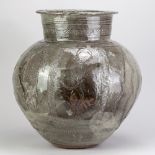 ASIBI IDO for Abuja Pottery; a very large stoneware water pot covered in glossy grey glaze decorated